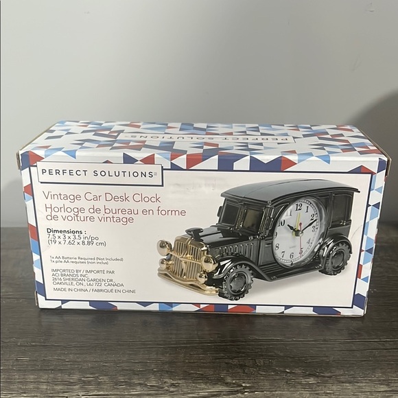 Black and Gold Clock with Vintage Car Design - Picture 1 of 2